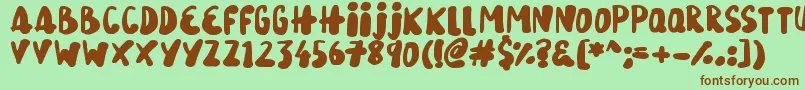 SnowySkies-fontti – ruskeat fontit vihreällä taustalla