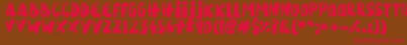 SnowySkies Font – Red Fonts on Brown Background