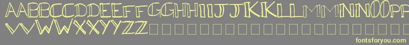 More about Kega Font Kega Font – Yellow Fonts on Gray Background