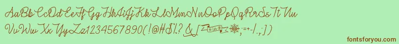 WinterInJanuaryTtf-Schriftart – Braune Schriften auf grünem Hintergrund