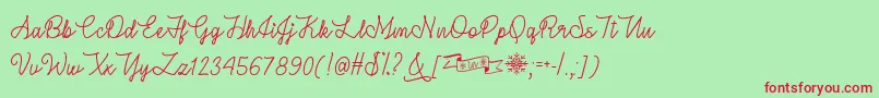 WinterInJanuaryTtf-fontti – punaiset fontit vihreällä taustalla