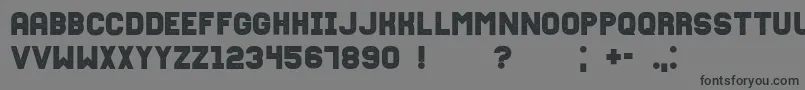 Fixationgrunged Font – Black Fonts on Gray Background