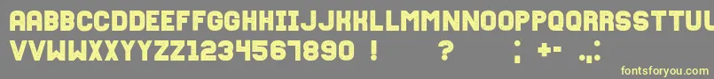 Fixationgrunged Font – Yellow Fonts on Gray Background