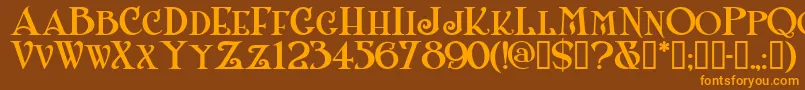 フォントShanlnc – オレンジ色の文字が茶色の背景にあります。
