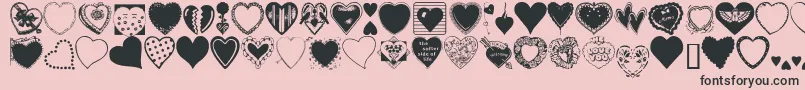 HeartsGalore-Schriftart – Schwarze Schriften auf rosa Hintergrund