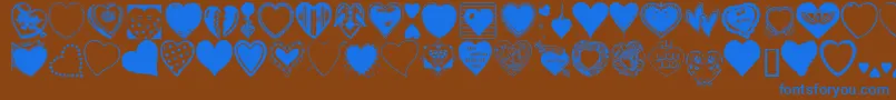 HeartsGalore-Schriftart – Blaue Schriften auf braunem Hintergrund