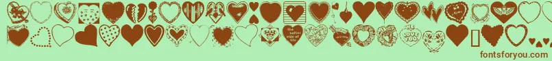 HeartsGalore Font – Brown Fonts on Green Background