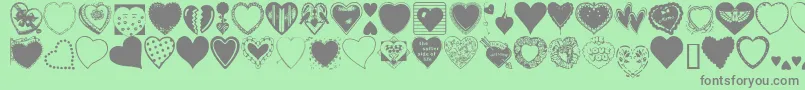 HeartsGalore Font – Gray Fonts on Green Background