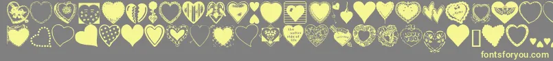 fuente HeartsGalore – Fuentes Amarillas Sobre Fondo Gris