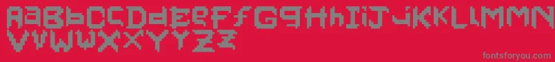 フォントPixelfaceonfire – 赤い背景に灰色の文字