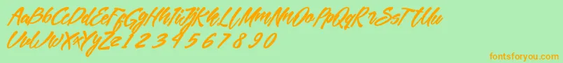 MekarScript Font – Orange Fonts on Green Background