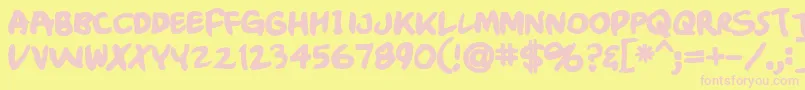 Crumbblack-Schriftart – Rosa Schriften auf gelbem Hintergrund