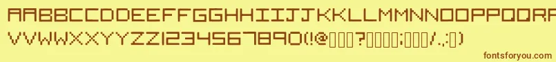 フォントSquared – 茶色の文字が黄色の背景にあります。