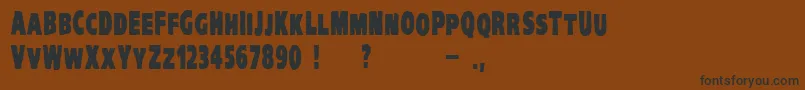 VtcKreepykomikatwoBold Font – Black Fonts on Brown Background