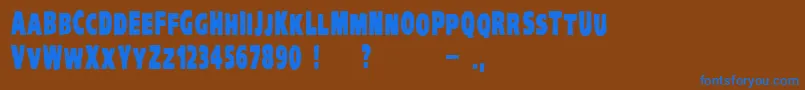 VtcKreepykomikatwoBold Font – Blue Fonts on Brown Background