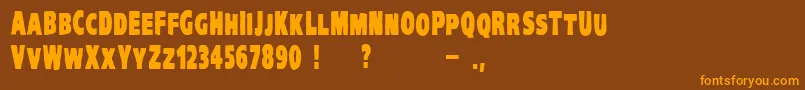 VtcKreepykomikatwoBold Font – Orange Fonts on Brown Background