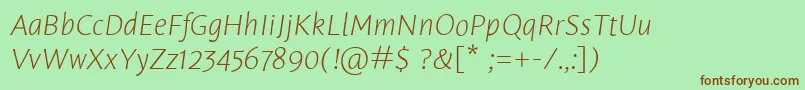 Fonte LeksasansproExtralightItalic – fontes marrons em um fundo verde