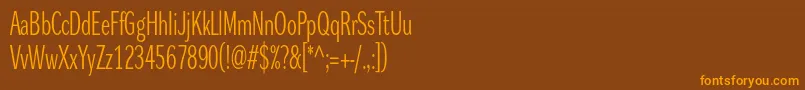 Шрифт Dynagrotesklxc – оранжевые шрифты на коричневом фоне
