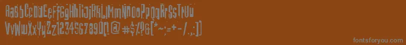 BatmosRegular-Schriftart – Graue Schriften auf braunem Hintergrund