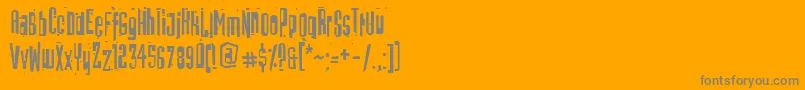 BatmosRegular-fontti – harmaat kirjasimet oranssilla taustalla