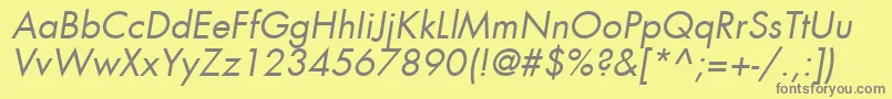 FuturaLtBookOblique-fontti – harmaat kirjasimet keltaisella taustalla