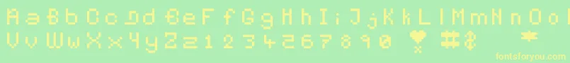 Pixelates Font – Yellow Fonts on Green Background