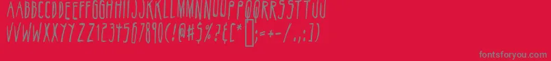 Belizarius-fontti – harmaat kirjasimet punaisella taustalla