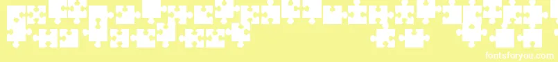 Fonte JigsawPiecesTfb – fontes brancas em um fundo amarelo