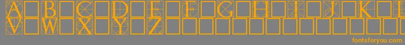 フォントWalrod – オレンジの文字は灰色の背景にあります。