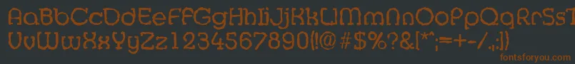 MexicorandomRegular Font – Brown Fonts on Black Background
