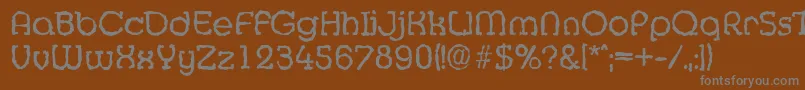 MexicorandomRegular Font – Gray Fonts on Brown Background