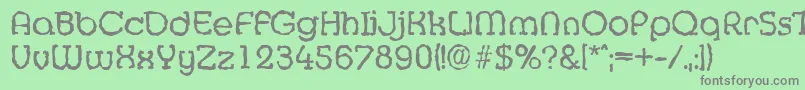 フォントMexicorandomRegular – 緑の背景に灰色の文字