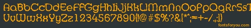 フォントMexicorandomRegular – 黒い背景にオレンジの文字
