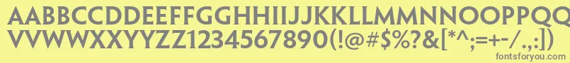 フォントPenumbrahalfserifstdSebd – 黄色の背景に灰色の文字