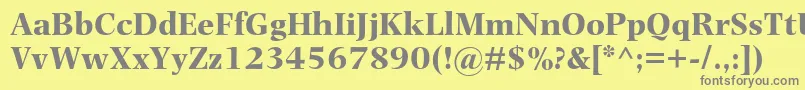 フォントPhotinamtstdBold – 黄色の背景に灰色の文字