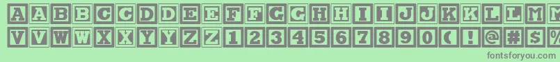 Шрифт Chock A Blocknf – серые шрифты на зелёном фоне