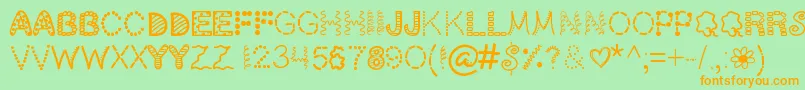 ScrapOHolic Font – Orange Fonts on Green Background