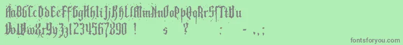 PillboxOpaque-Schriftart – Graue Schriften auf grünem Hintergrund