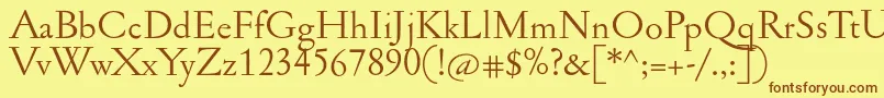 フォントJannonant – 茶色の文字が黄色の背景にあります。