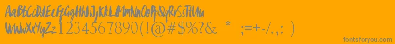 GypsyBrush Font – Gray Fonts on Orange Background