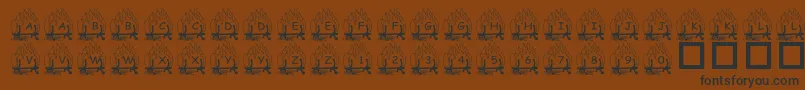 PfYulefire1 Font – Black Fonts on Brown Background