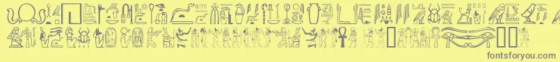 GreywolfGlyphs-fontti – harmaat kirjasimet keltaisella taustalla