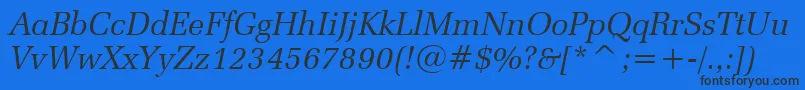 ZapfelliptBtItalic Font – Black Fonts on Blue Background