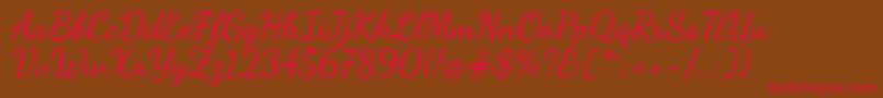 DancingscriptBold Font – Red Fonts on Brown Background