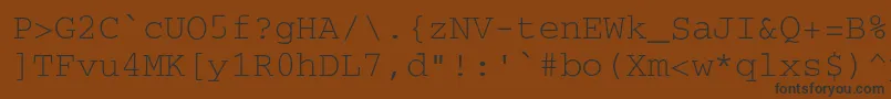 フォントSecretcodeNormal – 黒い文字が茶色の背景にあります