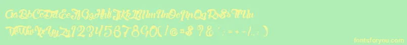 LaChatteAMaman Font – Yellow Fonts on Green Background