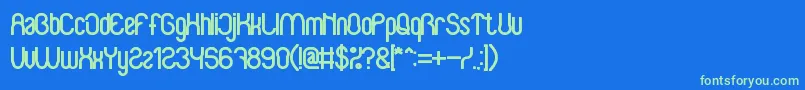 BabySuperheroBold Font – Green Fonts on Blue Background