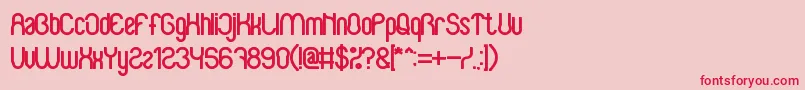 BabySuperheroBold-Schriftart – Rote Schriften auf rosa Hintergrund