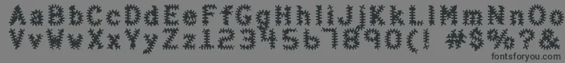 フォントHalterAntigenic – 黒い文字の灰色の背景