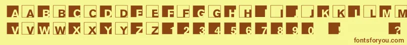 フォントAbclogosxyz – 茶色の文字が黄色の背景にあります。